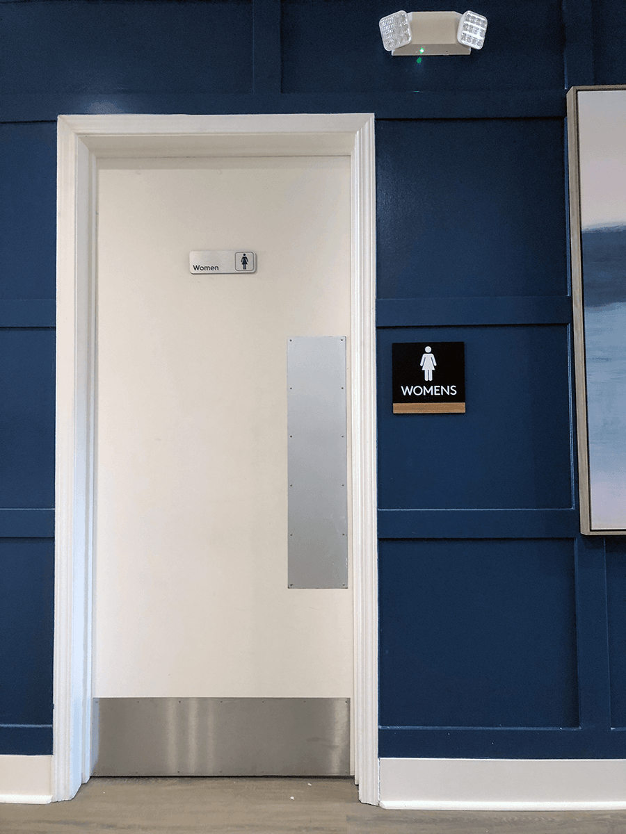 women's restroom ada sign blog post image